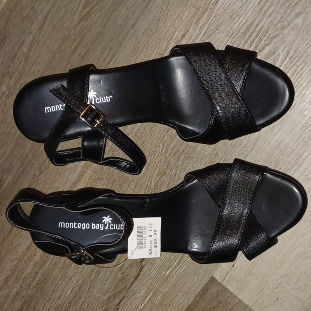 Brand new 8.5 black wedges